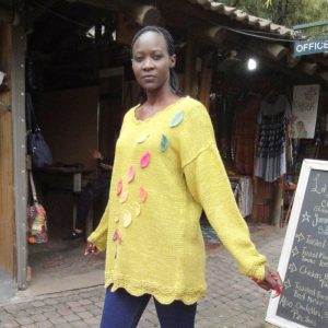 Autumn Leaves Pullover has a beautiful scalloped edge. Knitting instructions and worsted weight yarn kit is available.