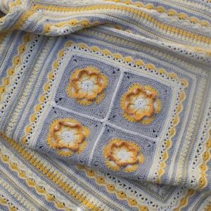Babypops - a Hooked on Sunshine blanket kit This colourway is called Tangerine Dream