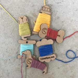 Yarn Bobbins in different shapes - dogs, bone, light house and traditional
