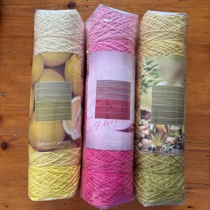 Cotton Scintilla Ombre Stacks - 6 balls of yarn in shades of one colour, stacked from light to dark.