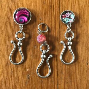 3 Portuguese Knitting Hooks on wooden table