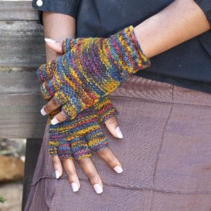 Ladies half finger gloves on hands.