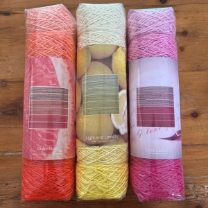 Pastiche Ombre Stacks - 6 balls of yarn in shades of one colour, stacked from light to dark.
