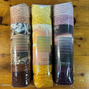Pure Merino Ombre Stacks - 6 balls of yarn in shades of one colour, stacked from light to dark.