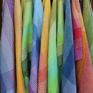 Consolidation Course Kit - a row of colourful, handwoven dish cloths
