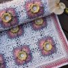 Sunshine Symphony Afghan / Blanket Rolled up