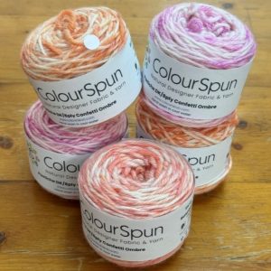 Pastiche Confetti Ombre - we randomly sprinkle 6 shades of a colour on a single ball of yarn, in order to to give a lightly dappled effect.