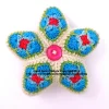 Handmade crocheted star decorations with buttons, colourful yarn craft by Heidi Bears Designs. Little Star Blue