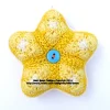 Handmade crocheted star decorations with buttons, colourful yarn craft by Heidi Bears Designs. Little Star Yellow