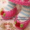 Close up of Pigwig shoes - pink with embroidered flowers